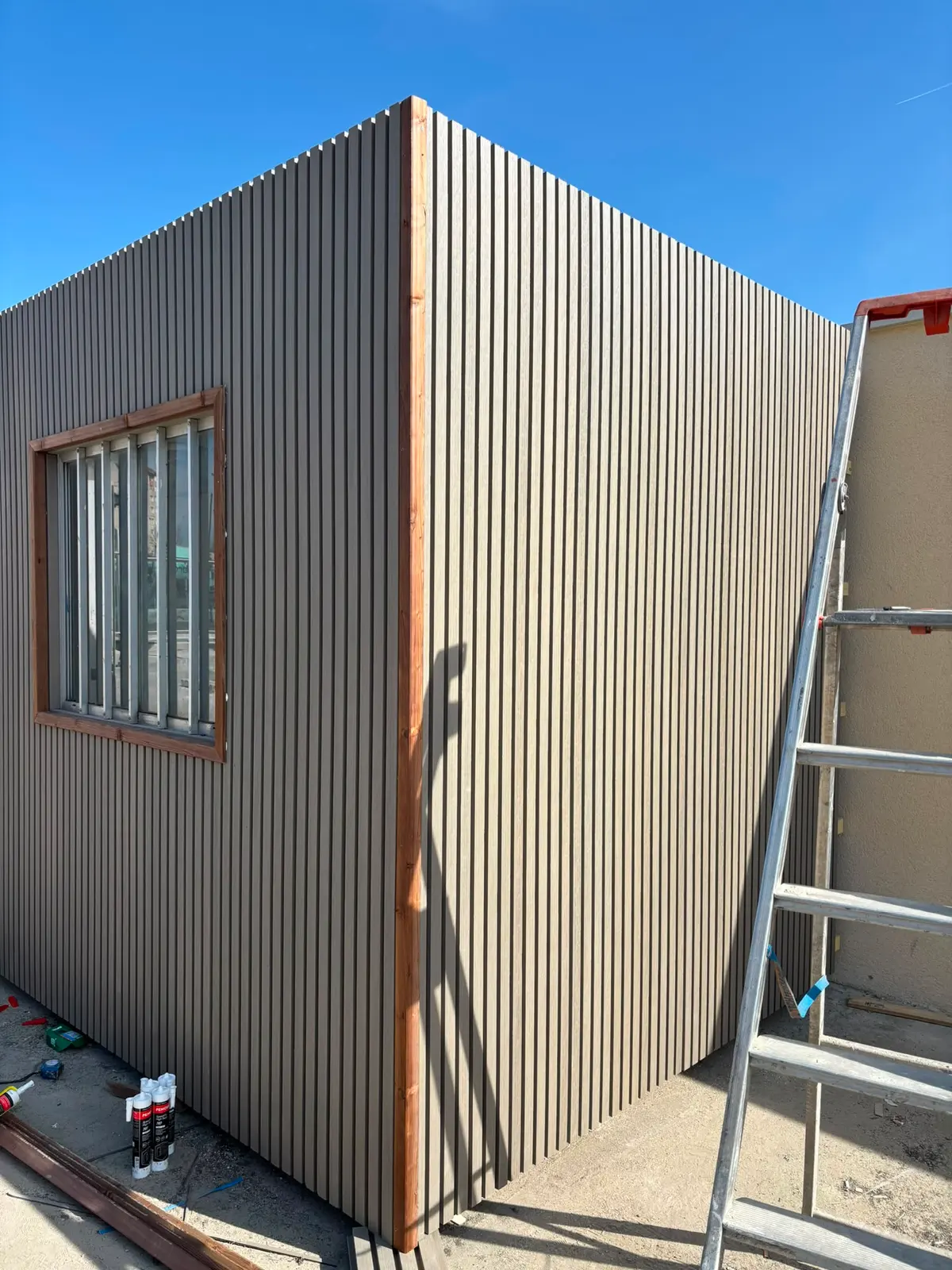 Façade habillée en bardage bois, après travaux